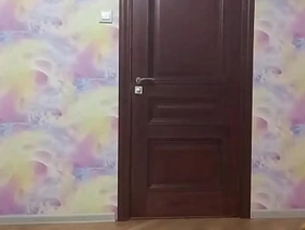 Crossdresser smokes and poses in long tight dress