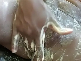 Kenyan African boy jerks off big dick outdoors and cum
