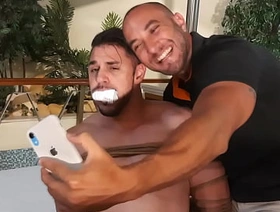 Peter tied up and mouth stuffed with sock taking selfie with Victor to expose him undefined PREVIEW
